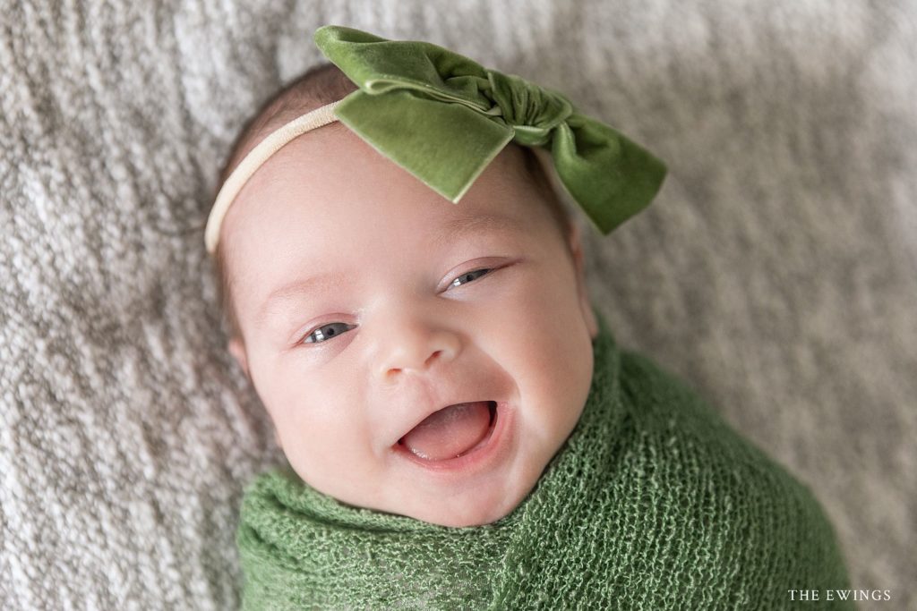 Big belly laughs during at Newborn Session at The Ewings, a portrait photography studio in North Central Massachusetts.