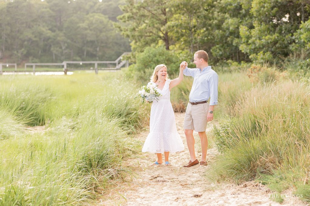 A bride and groom in Cotuit in MA after their Cape Cod elopement wedding ceremony, with light and airy pictures by The Ewings.