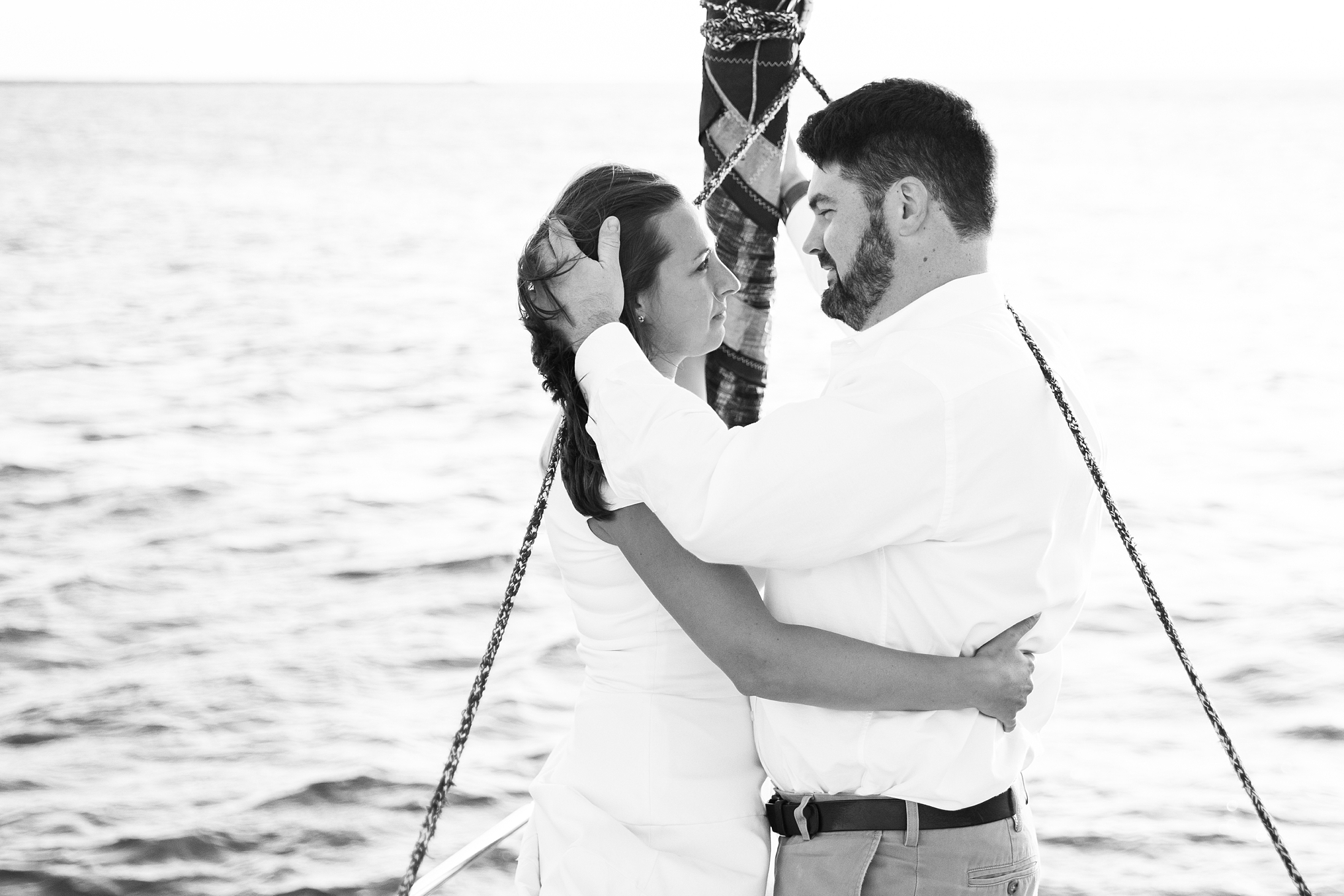 This is a sailboat engagement session on the Long Island Sound by CT Wedding Photographer and Videographers The Ewings