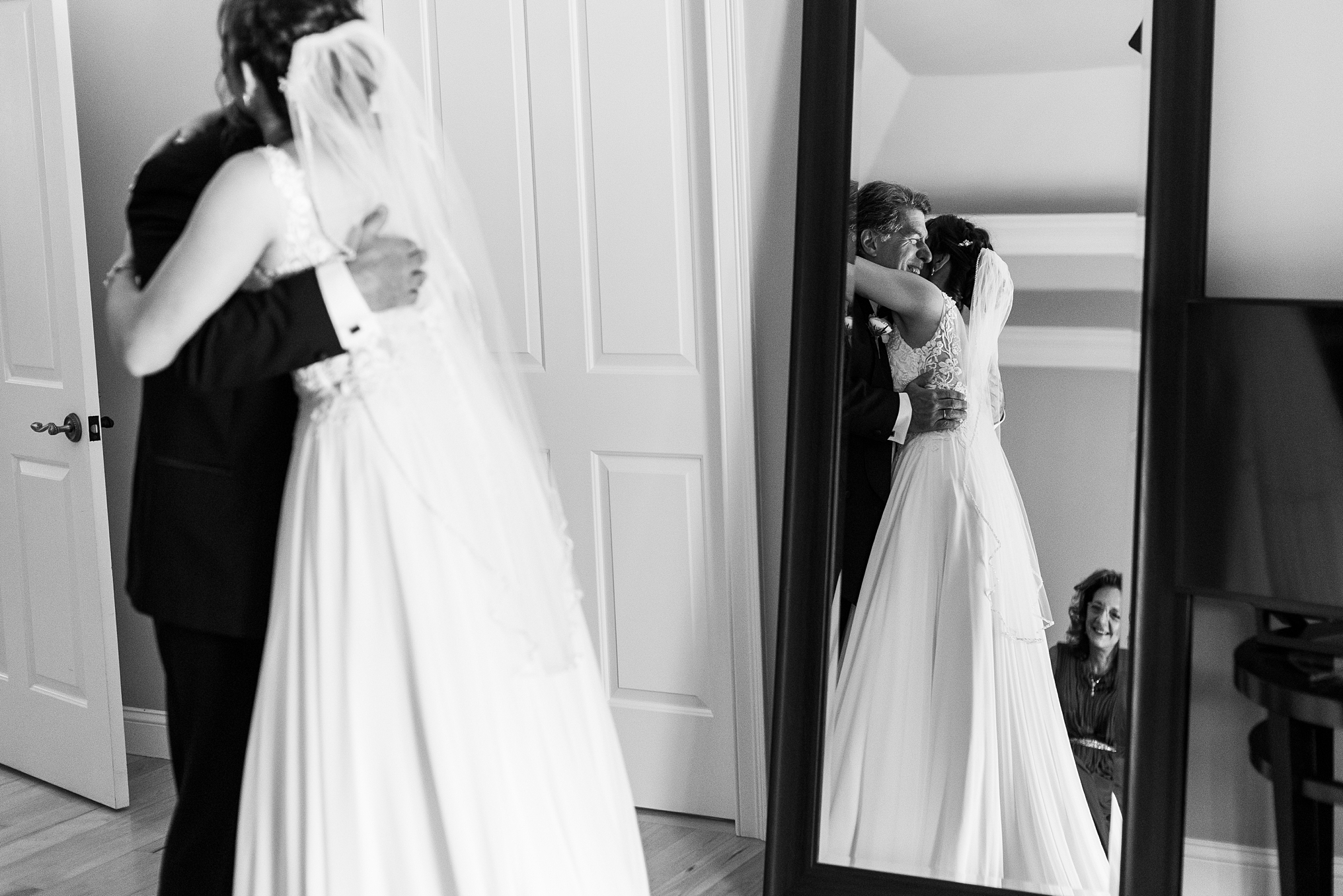 Dad sees his daughter for the first time on her wedding day, with mom looking on.