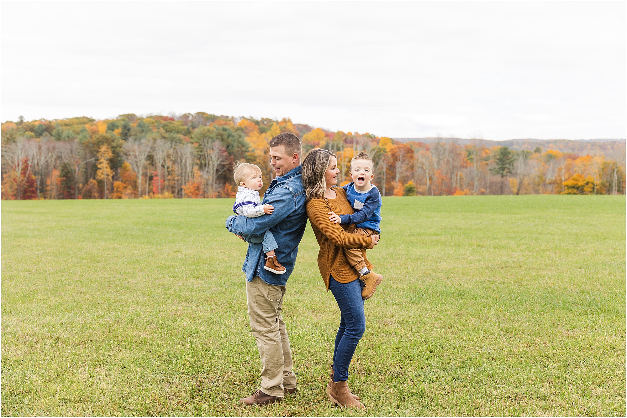 outdoor family portrait session in central massachusetts with foliage and classic new england views - spencer massachusetts