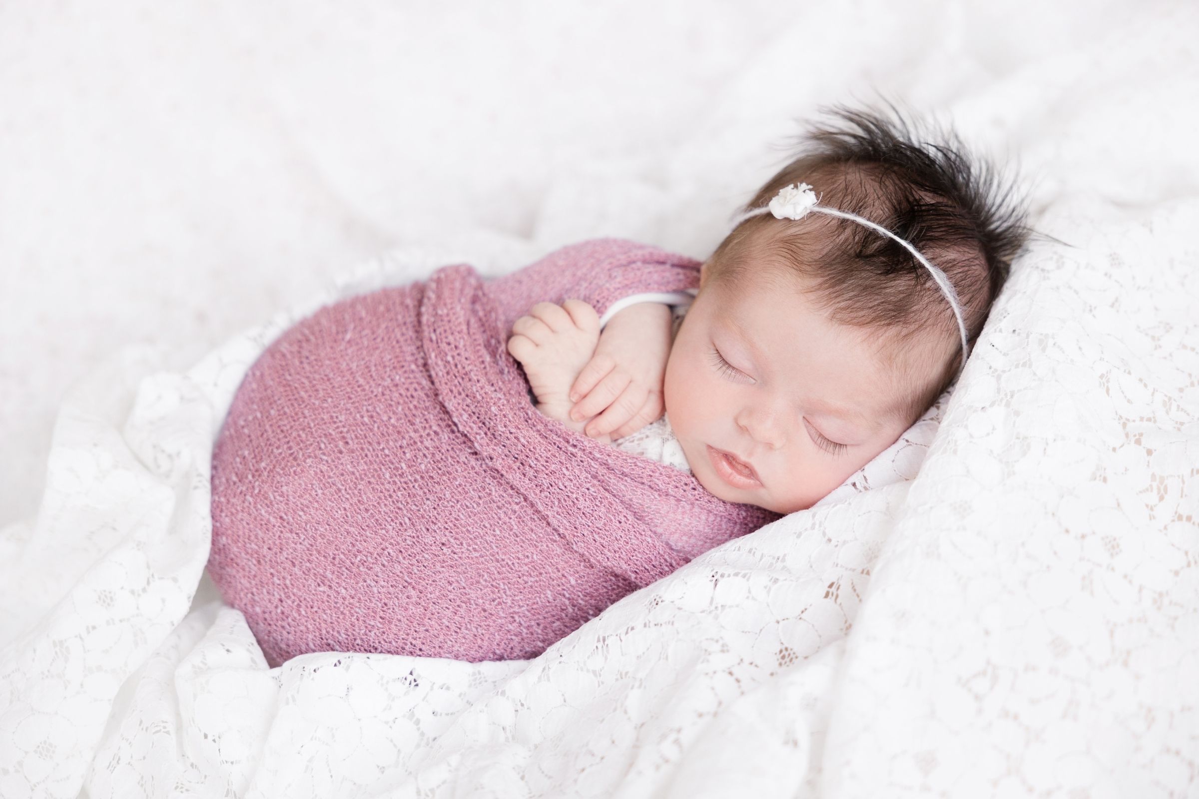 The best newborn photographer in the Greater Boston and Central Mass area, who provides a luxury in-home experience.