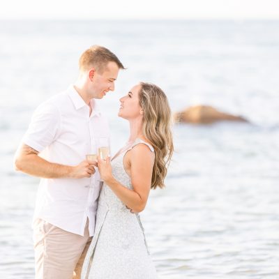 A Gloucester MA beach engagement session that is light and airy in the ocean.