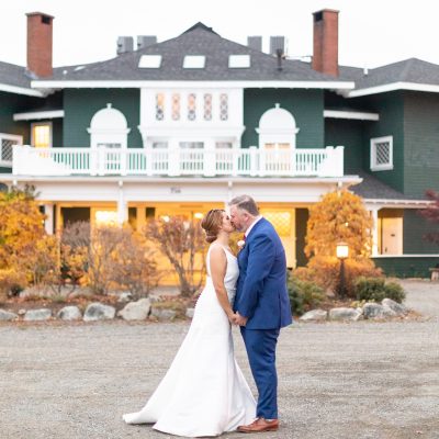 A coastal Maine destination weekend wedding venue at Frenchs Point in Stockton Springs Maine features a cliffside mansion overlooking Penobscot Bay.